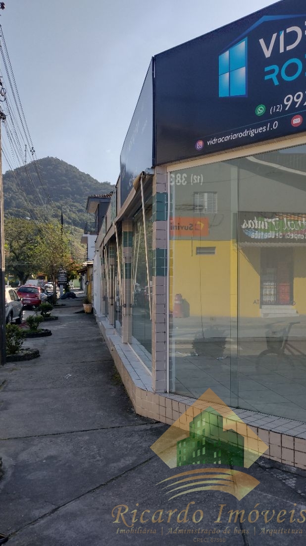 Casa de três dormitórios mais quatro salas comerciais à venda no centro