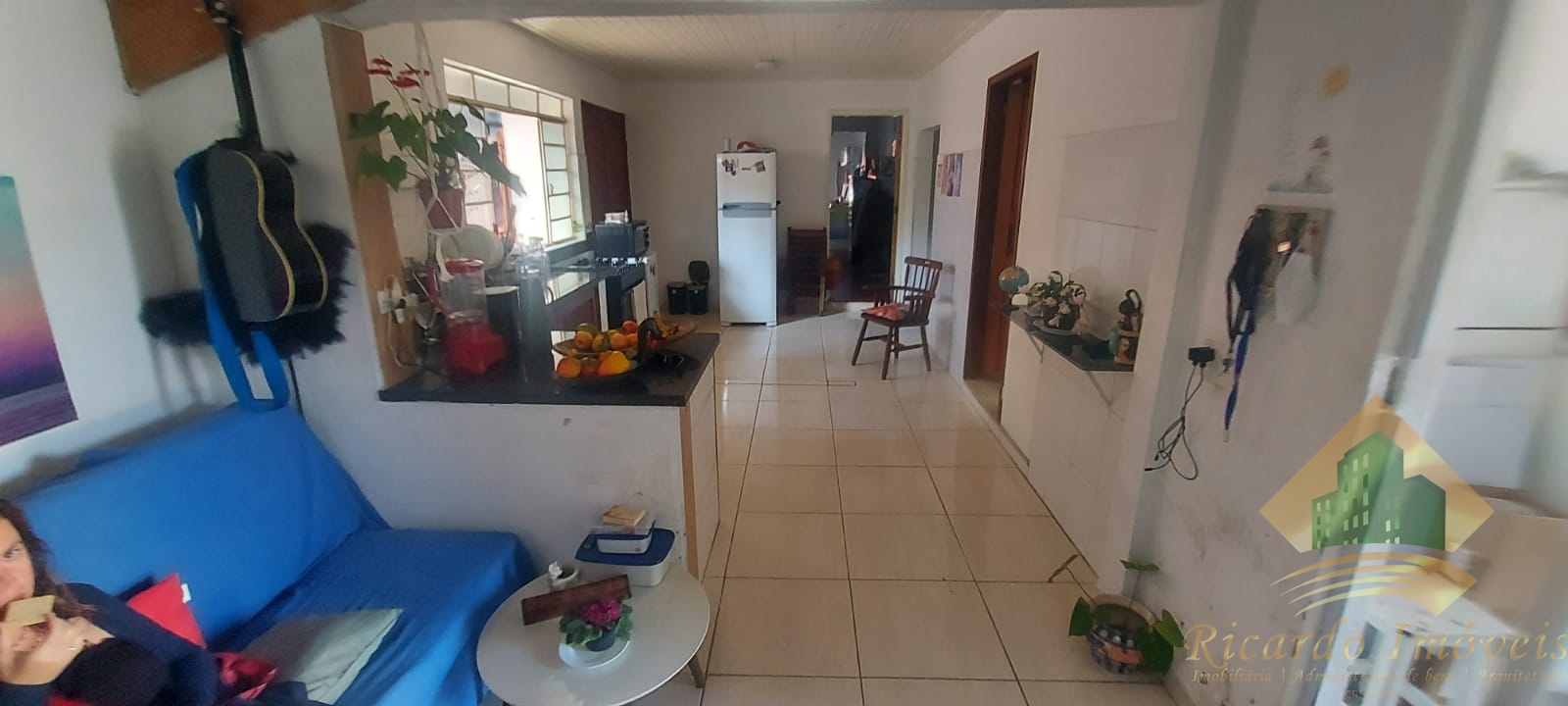 Casa de três dormitórios mais quatro salas comerciais à venda no centro