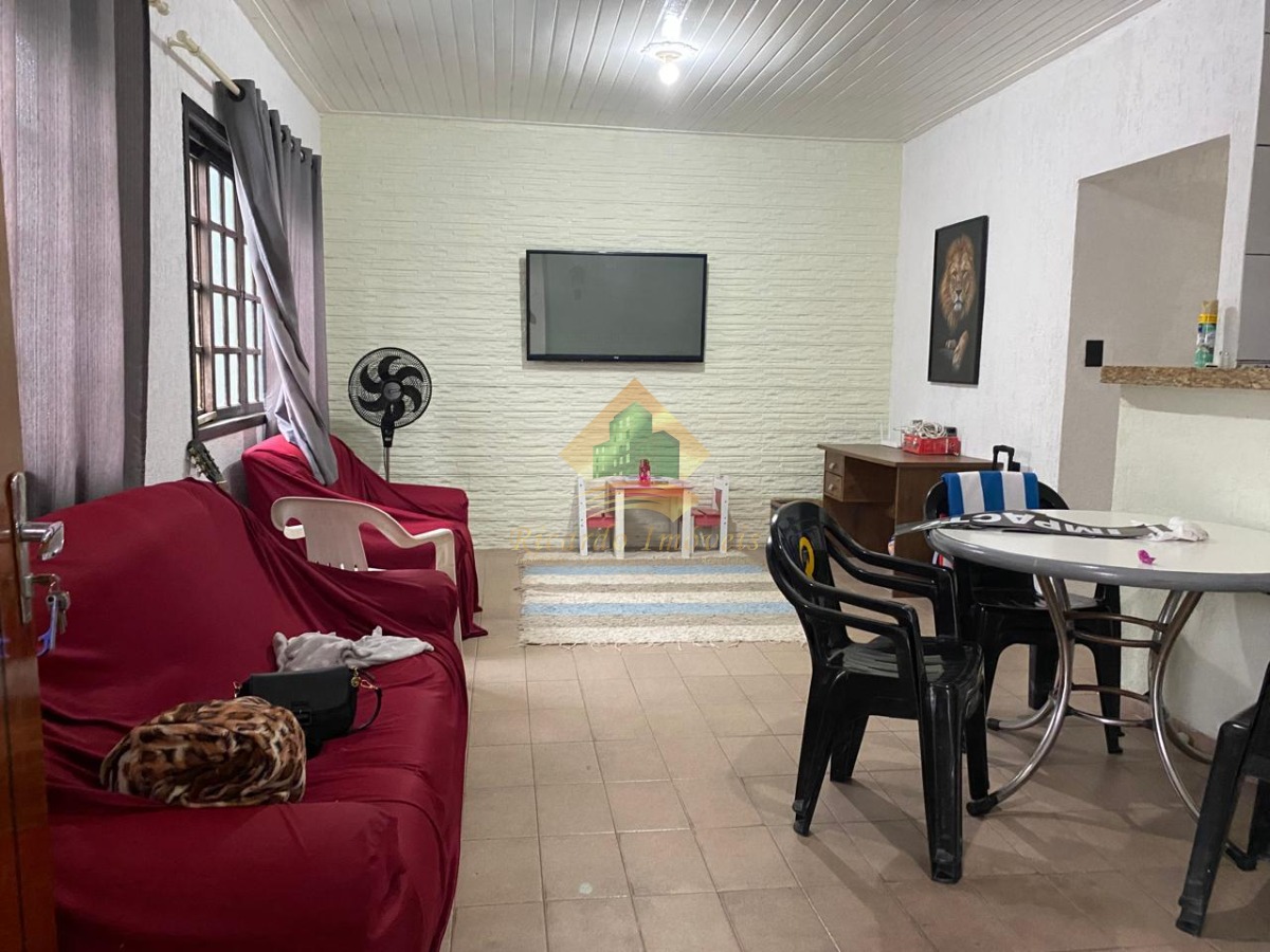 Linda casa localizada no bairro perequê-açu